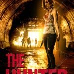 Woman holding a knife in a tunnel facing approaching zombies on a survival thriller premade book cover